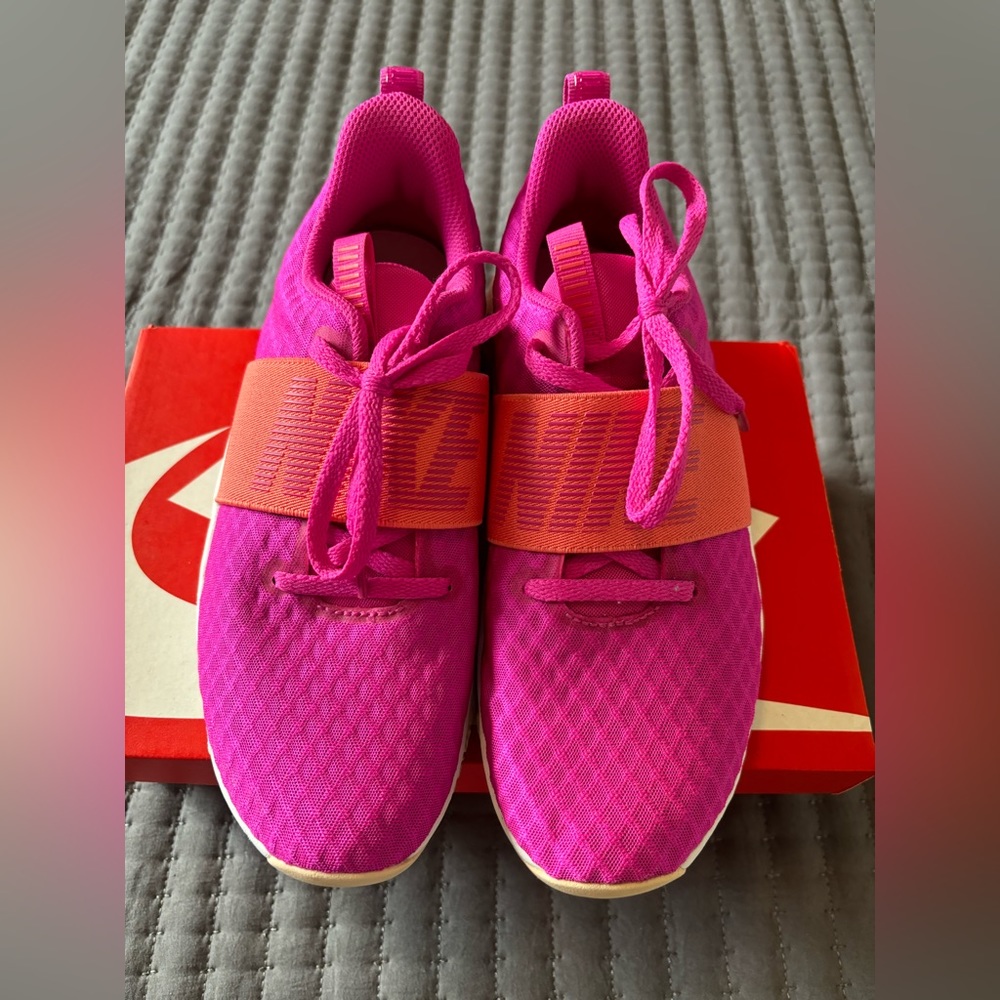 Pink and orange Nike, tennis shoes